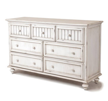 Monaco Seven Drawer Dresser in a distressed blanc finish Monaco Seven Drawer Dresser in a distressed blanc finish