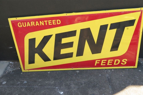 SUPERB VINTAGE KENT FEEDS EMBOSSED PRESSED METAL LARGE ADVERTISING SIGN.