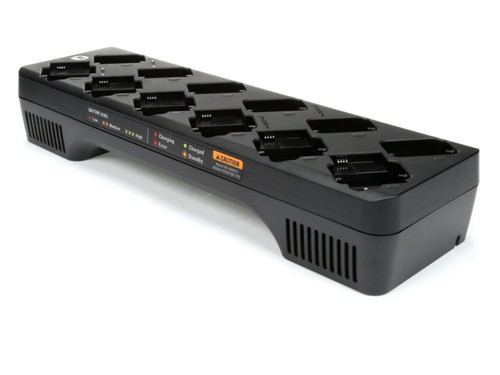 This 12-slot multi-unit charger saves time by copying settings from a single radio to a fleet of radios. It requires only a single outlet rather than several to preserve space and is compatible with Motorola DLR and CLS 2-way radios. This 12-slot multi-unit charger saves time by copying settings from a single radio to a fleet of radios. It requires only a single outlet rather than several to preserve space and is compatible with Motorola DLR and CLS 2-way radios.