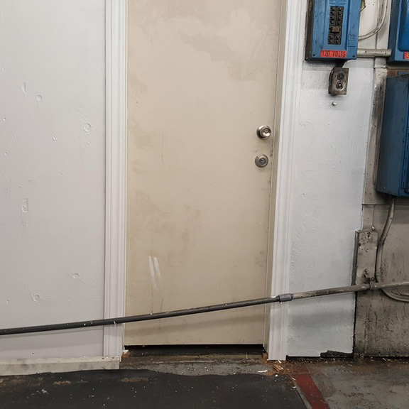 pipe-infront-of-door.jpg