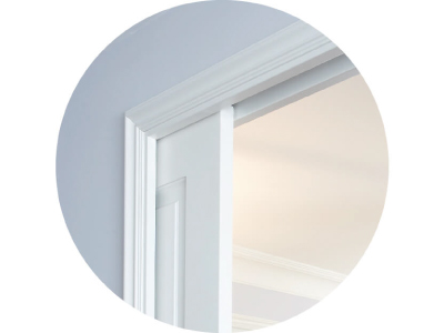 A close-up of the architrave around a classic style pocket door system.