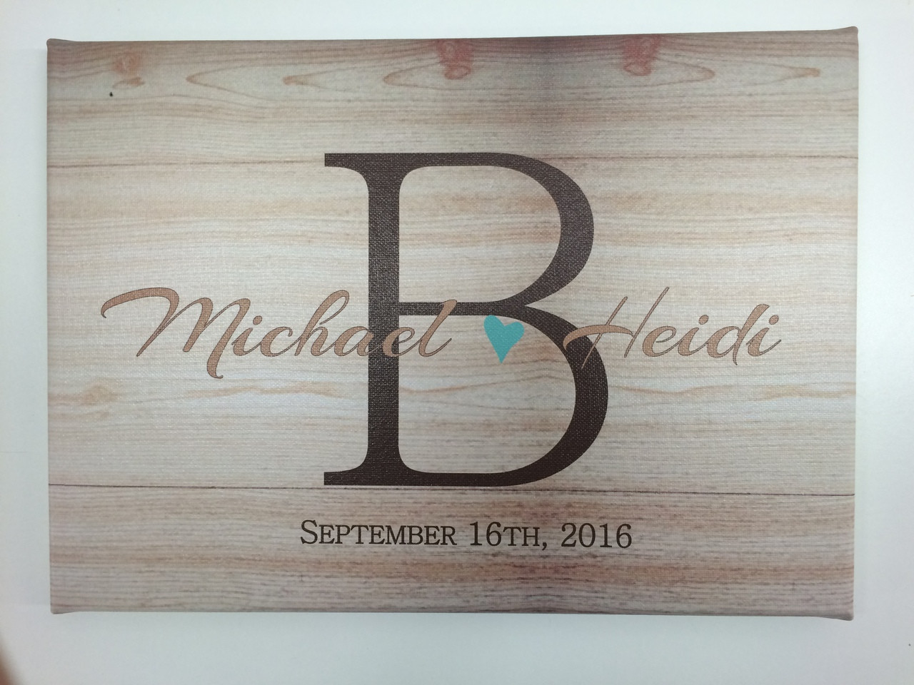 woodgrain canvas print monogram letter with couple s name