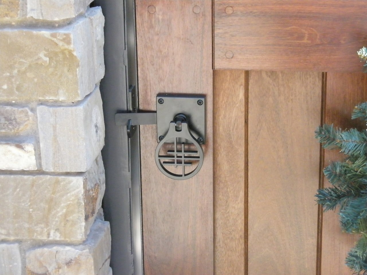 Asian inspired design gate hardware package installed gate closeup