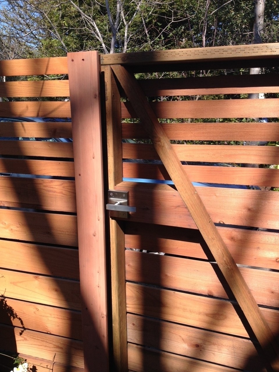 Contemporary Alta Stainless Steel Gate Latch on Double Wooden Gate Back