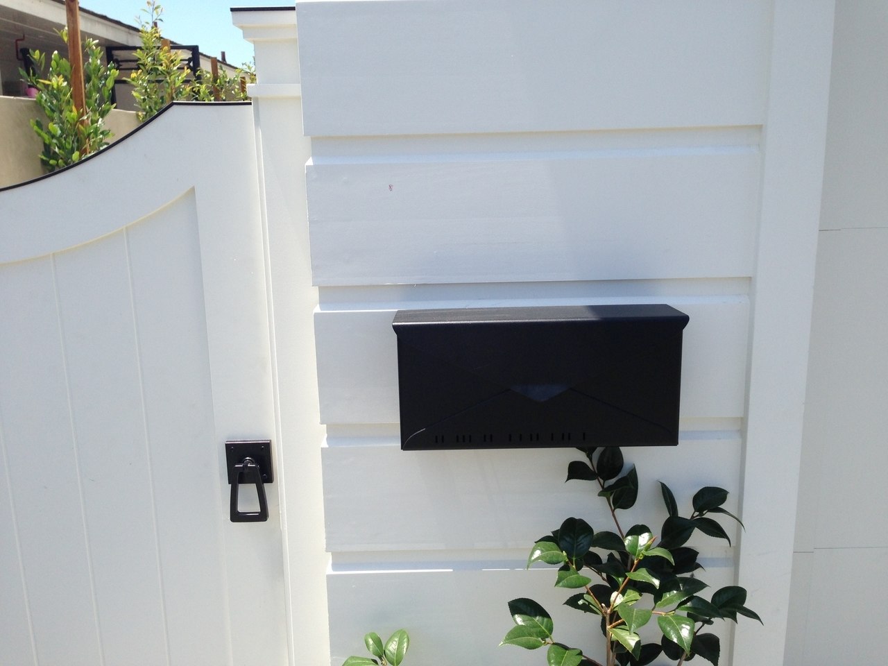 Modern gate hardware package with tapered ring installed on gate