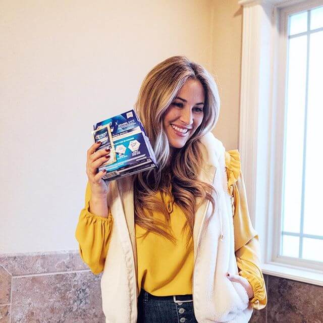 Crest 3D Whitestrips Laura Rieckhoff in Bathroom | Crest White Smile