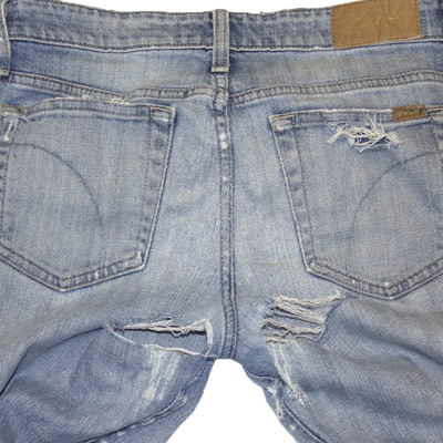 Like a denim doctor, we repaired this jean with large holes.