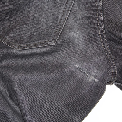 Damaged jean repair on Williamsburg denim.