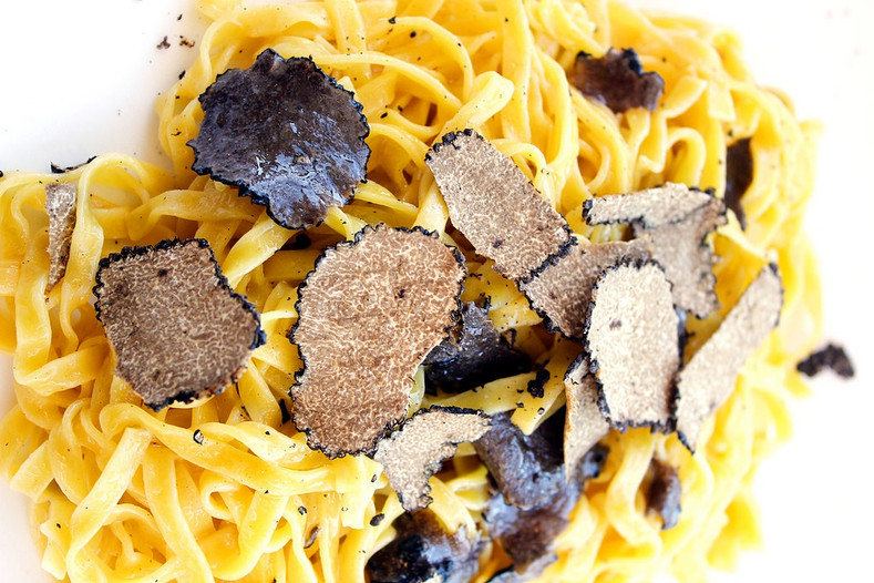 Linguine topped with fresh Black Truffles