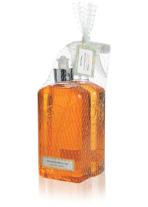Orange Kitchen Soap and Surface Cleaner bottles packaged together in netting