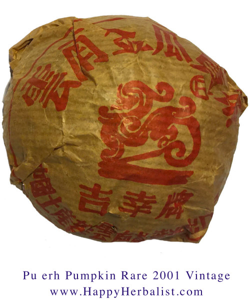 Pu erh Pumpkin Rare 2001 Vintage Pu erh Tou Cha shaped like a Birds Nest but the outside is like a Pumpkins Skin