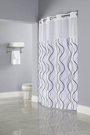 Available in different styles to complement any decor, the Waves Hookless® shower curtain is not only handsome - it's also extra durable because it's made for hotels. It installs in seconds and operates smoothly without tugging or snagging. The Waves Hookless® shower curtain curtain "stacks" beautifully for a neat appearance when pushed to the side. The Waves Hookless® shower curtain with "It's A Snap"™ liner works with any shower rod, but combine it with The Arc ™ curved shower rod for an elegant upgrade.The Waves Hookless® shower curtain features a white polyester fabric with a two-tone printed wave pattern in gray and black and a translucent fabric window.
100% Polyester fabric with coordinating sheer fabric window
Two piece set including replaceable Snap-in Liner
Water repellent snap-in liner with magnets resists soap scum and minimizes mold and mildew
Chrome raised Flex-On rings allow 10 second installation without removing the shower rod
71 by 77 inches
Available in white
Call 855-468-3528 or click here to email us about large quantity purchases.