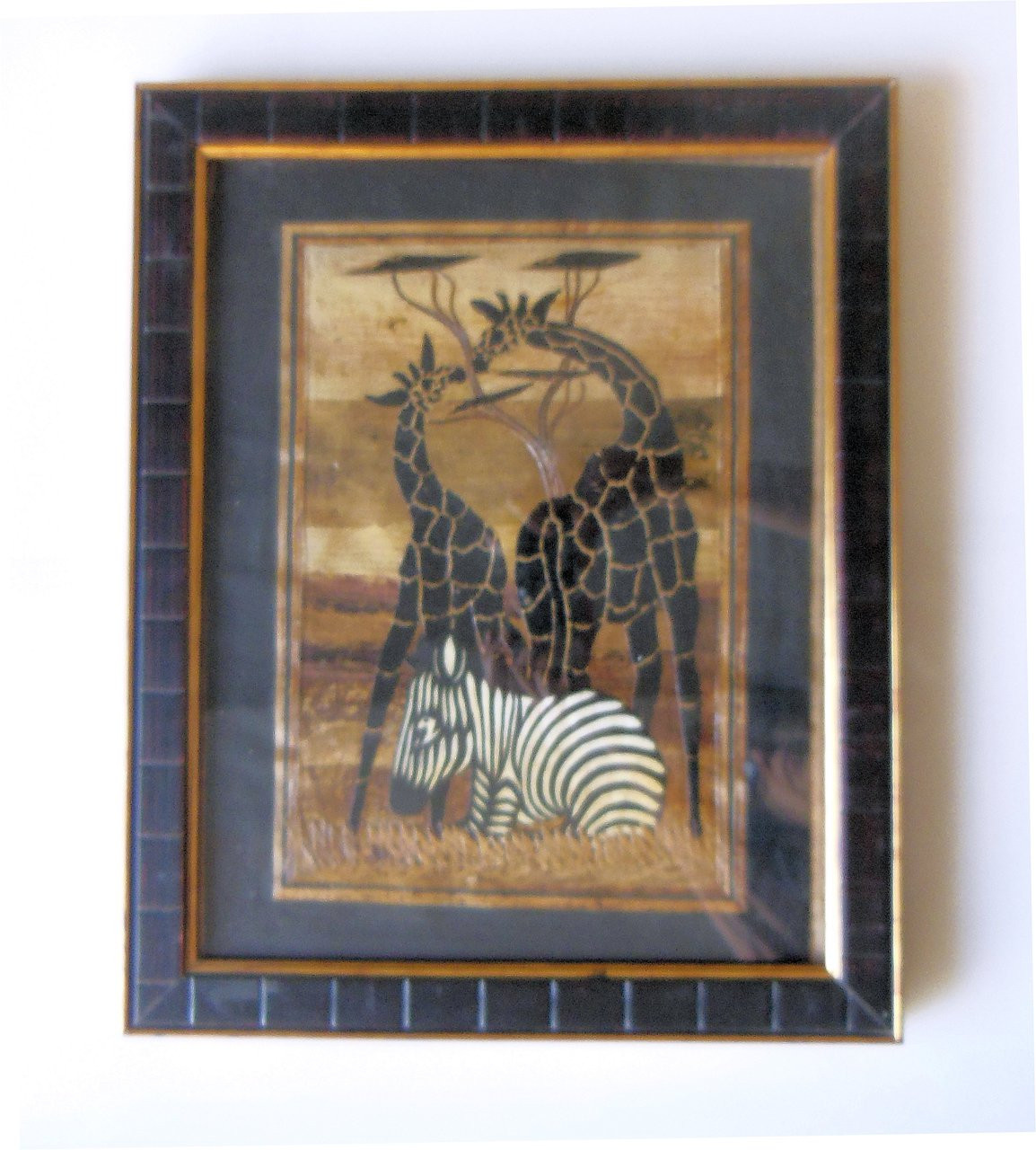 Tanzania- Wood on Fabric. Wild Animals in frame.
