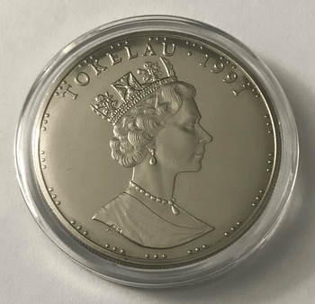 1991 $5 Tala Tokelau - Pearl Harbor Anniversary Coin In Capsule KM# 11 1991 $5 Tala Tokelau - Pearl Harbor Anniversary Coin In Capsule KM# 11