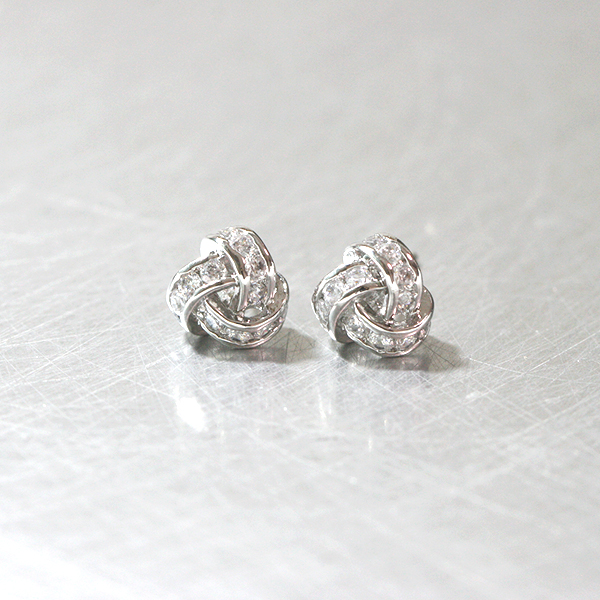 Swarovski White Gold Triangle Knot Earrings Studs from kellinsilver.com