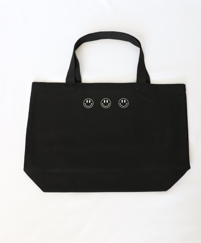 JUST SMILE BLACK CANVAS TOTE with 3 HAPPY FACES on back.