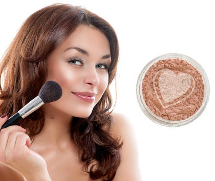 young-woman-showing-mineral-blush-application.jpg