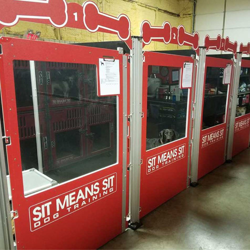 Red dog kennel gates for Sit Means Sit.