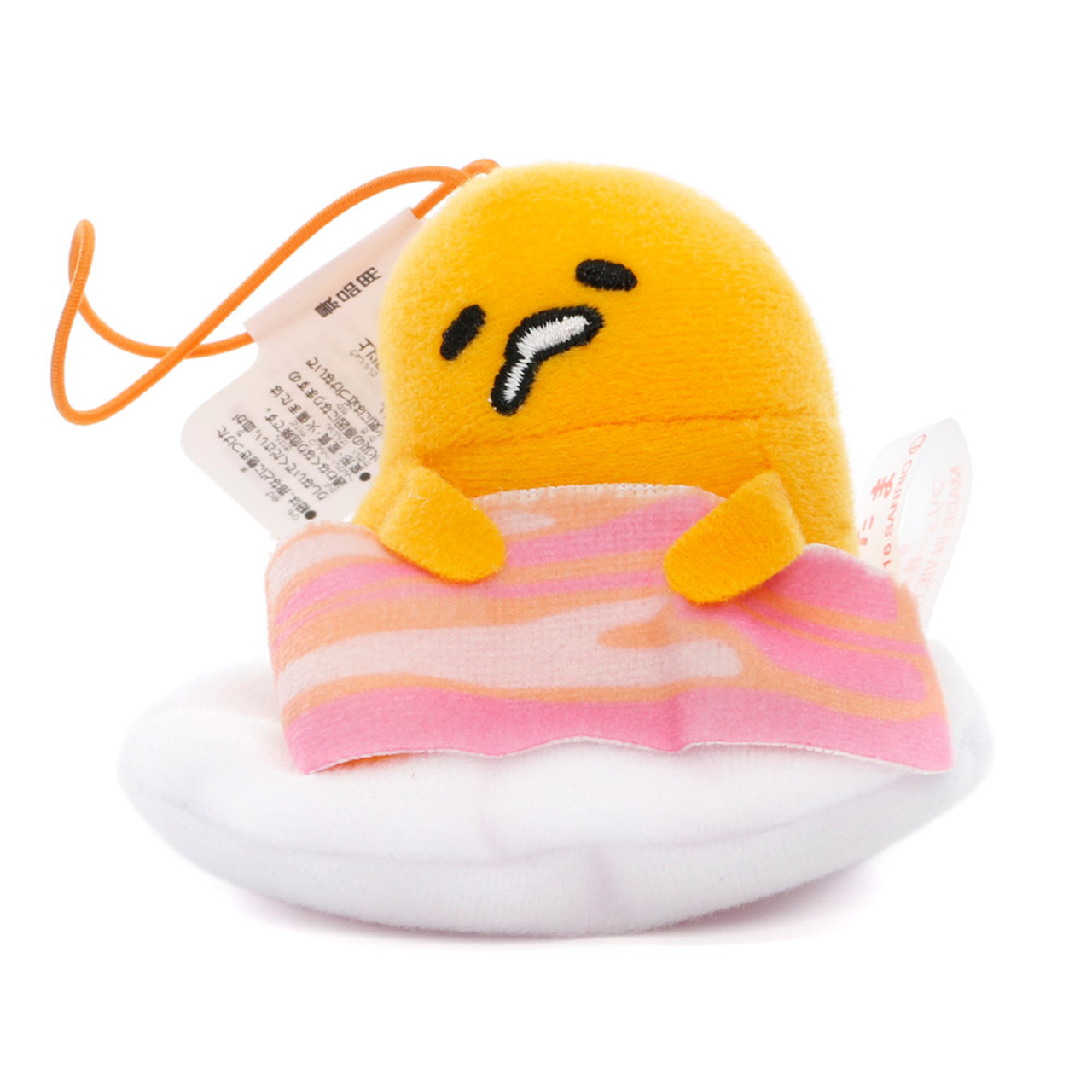 https://cutewares.com/12-off-sanrio-gudetama-lazy-egg-sleeping-mascot-plush-charms-sausage/