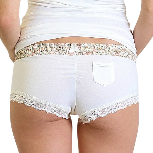 Ivory boy shorts with floral waistband and pocket