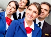 12619973-portrait-of-friendly-airplane-cabin-crew-looking-happy.jpg