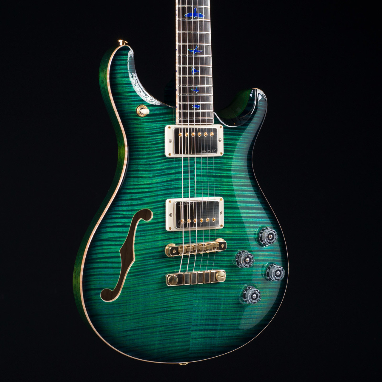 PRS-McCarty-594-Semi-hollow-with-f-hole-Private-Stock-6409_238402_Angle-Left__58648.1492184430.jpg