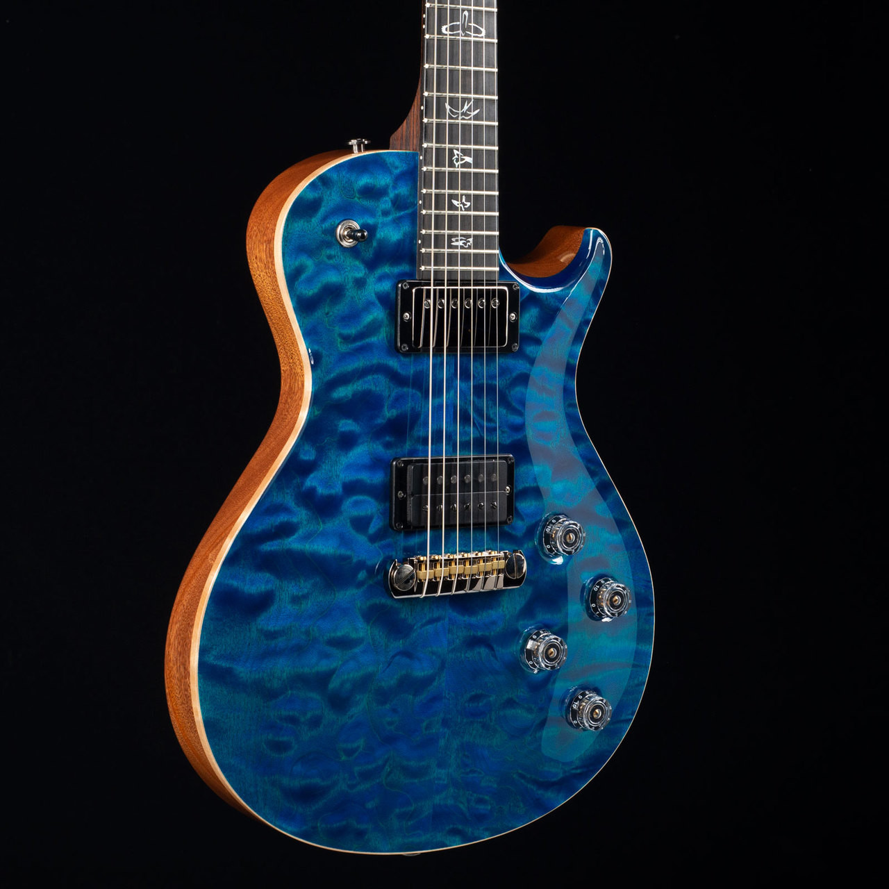 PRS-Tremonti-10-Top-Wood-Library_256061_Angle-Left__30984.1535053457.jpg