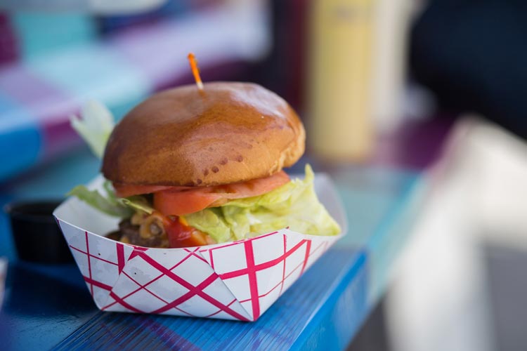 Cheeseburger from a food truck at a school carnival