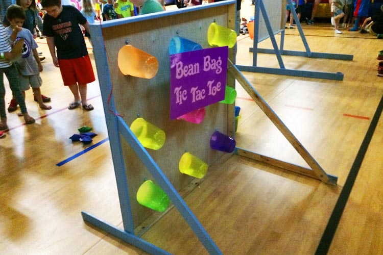 Indoor school cafeteria Bean Bag Toss for a carnival held indoors because of bad weather