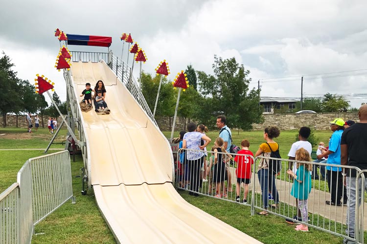 mom-and-kids-on-a-slide-cloudy-day.jpg