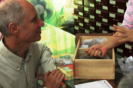 Heiner Fruehauf assessing herb quality