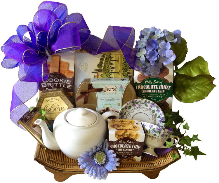 This elegant wood tray will make a beautiful home accent to display spa products in the bathroom, fresh fruit on the table, used to serve appetizers when entertaining, or a multitude of other uses, It includes herbal dessert tea, teapot, cup and saucer, award winning chocolates, cheese, crackers, cookie brittle, and an assortment of delicious cookies.