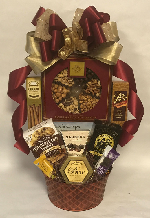 A delicious assortment of gourmet items, snacks and desserts! They can munch on this all week, or share it with friends and family! Includes chocolate nuts, candied nuts, roasted cashews, classic mixed nuts, honey peanuts, snack mix, chocolate sea salt caramels, cheese, crackers, honey mustard pretzels, and assorted cookies.
Add a free ribbon banner with any message of your choice!
Items of equal or greater value may be substituted depending on availability.