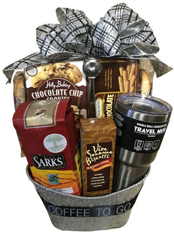 A very special gift for any coffee lover! The elegant silver tin is filled with a large bag of 100% Organic, Whole Bean, French Roast coffee, a double walled, stainless steel travel mug (keeps liquid hot for 8 hours and cold for 18 hours), a unique, stainless steel coffee scoop that is also a coffee bag clip to keep the coffee bag sealed and fresh once opened (genius!) To enjoy with the coffee we added almond & orange biscotti, classic chocolate chip cookies, and rolled & chocolate filled cookies.
This gift is great for Father's Day, Birthdays, or any occasion! The ribbon banner can have any message of your choice.
(Items of equal or greater value may be substituted, depending on availability, or discovery of great new items.)