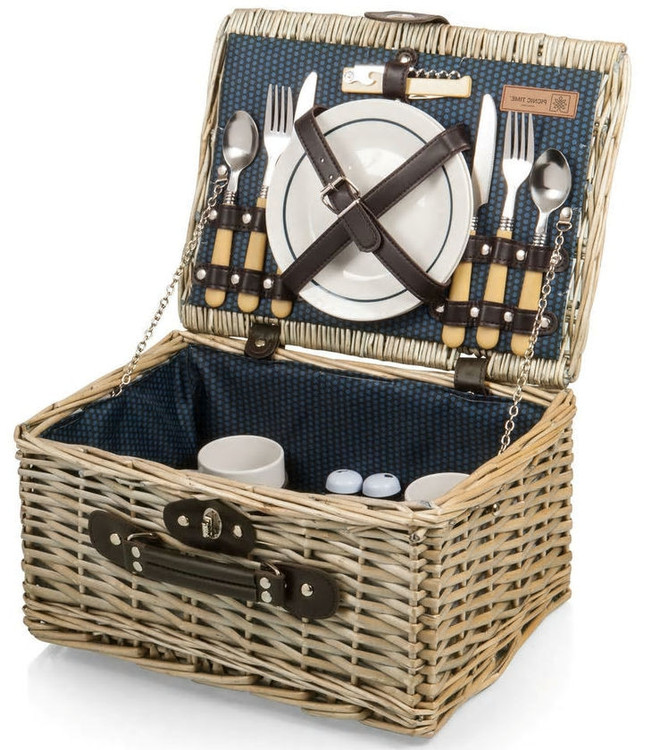 style picnic basket. It includes two each - ceramic plates, ceramic mugs, and silverware, along with a salt and pepper shaker, and stainless steel, waiter style corkscrew.
If you would like to upgrade the basket to include an assortment of sweet and savory gourmet items, just give us a call.
