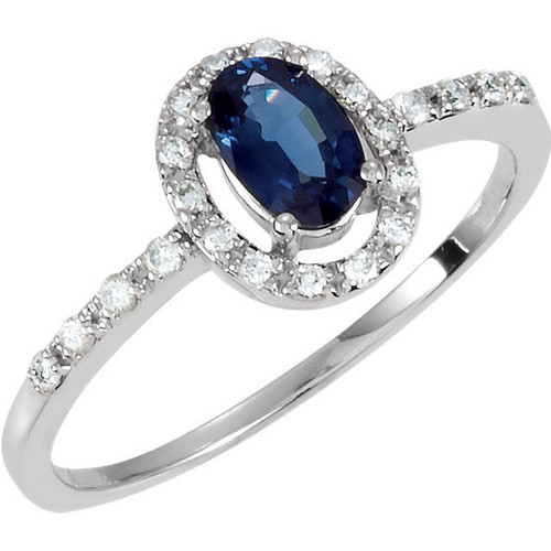 Blue sapphire & diamond halo ring