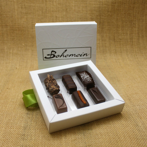 Overwhelmed by choice?
Let our knowledgeable Staff and Chocolatiers make the decisions for you.
Our recommended assortment is Seventy Truffle, Noisette (Hazelnut), Sea Salt Caramel, Cointreau Ganache, Rosemary and Apricot, Melting Passion Ganache.