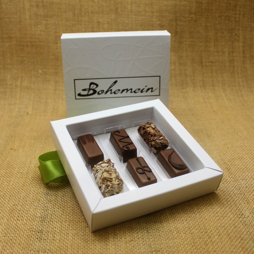 Bohemein 6 Milk Chocolates Gift Box includes: Chocolate Caramel, Maple Cream, Coffee Truffle, Amaretto Truffle, Vanilla Cream Milk, Cointreau Ganache.