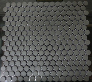Unglazed black penny round mosaic tiles