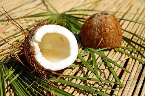 The bright and delightful scent of freshly opened coconuts. Reminicent of beachs, fairs and holiday time.