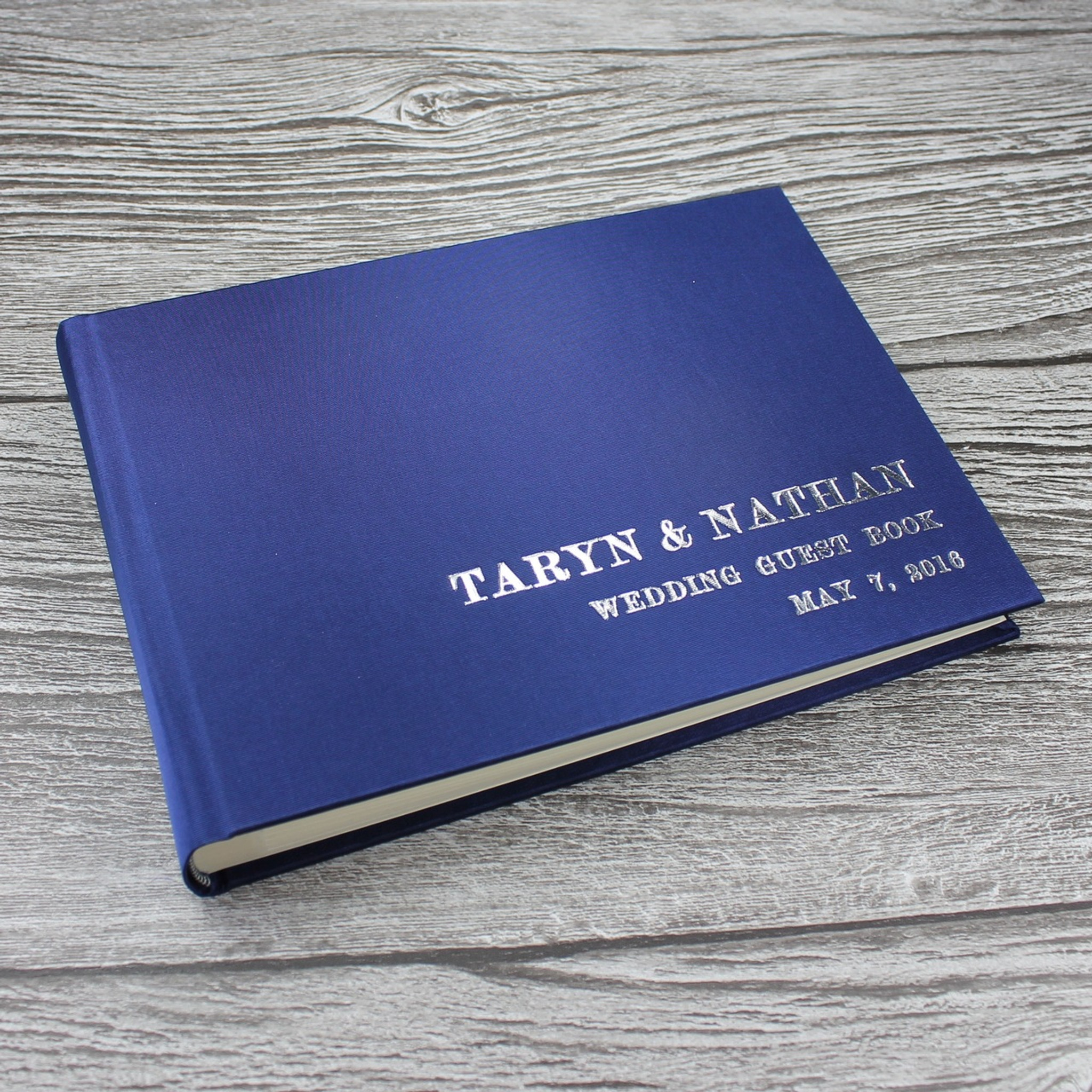 midnight blue satin photo booth guest book bespoke album company