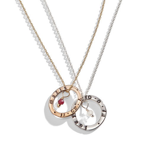 Celebrian Stacking Ring Necklace in oval and round charms. Celebrian Stacking Ring Necklace in oval and round charms.