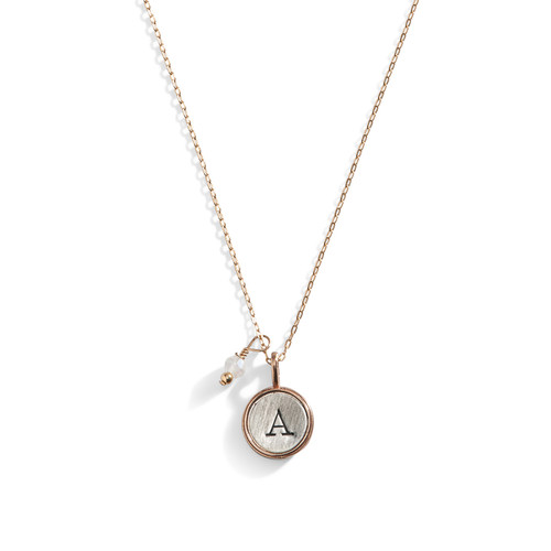 Super Small Initial Disc Necklace with Bronze Rim and Sterling Silver Center. Super Small Initial Disc Necklace with Bronze Rim and Sterling Silver Center.