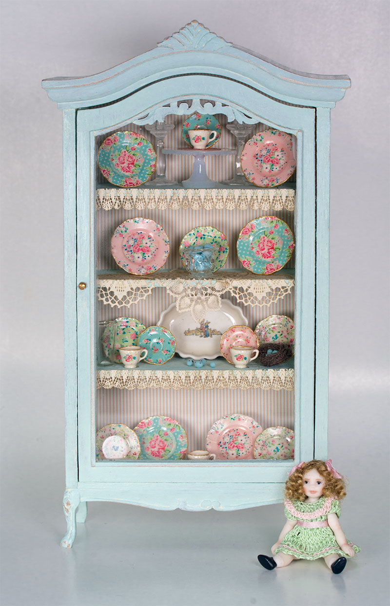 chalk painted collector's cabinet